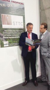 Alberto Romero discusses AEIM’s STTC brochure with a stand visitor at Maderalia